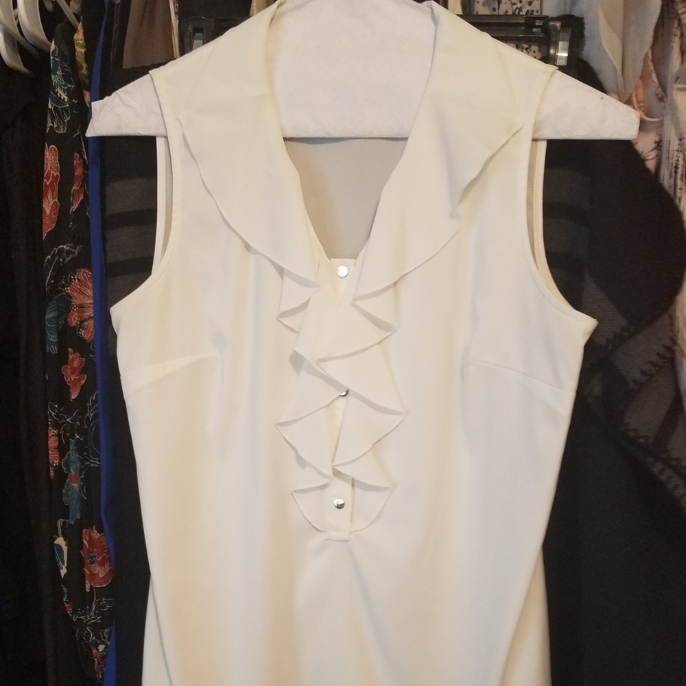 Cream ruffle-front top